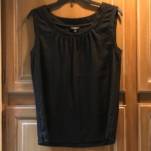 Woman’s sleeveless top. Worn once.
